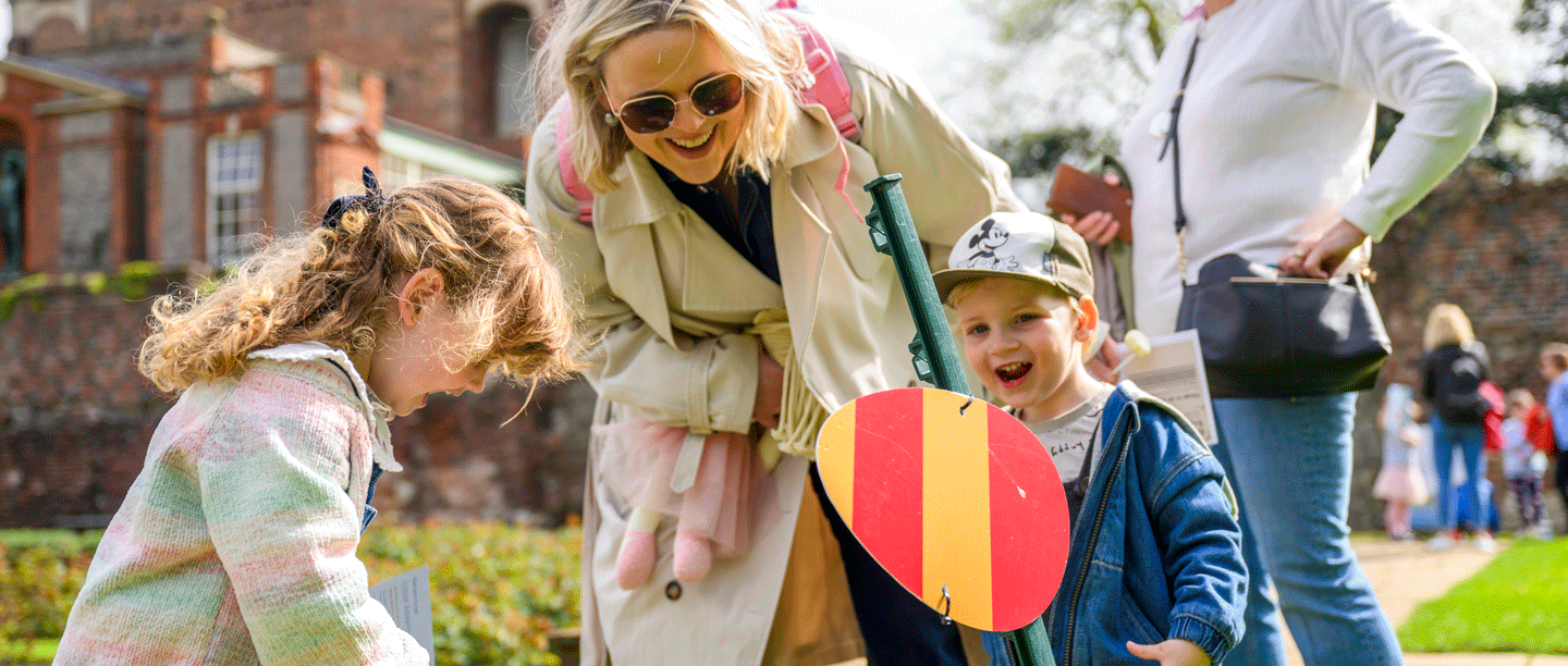 Image: a family enjoys Easter fun at Eltham palace